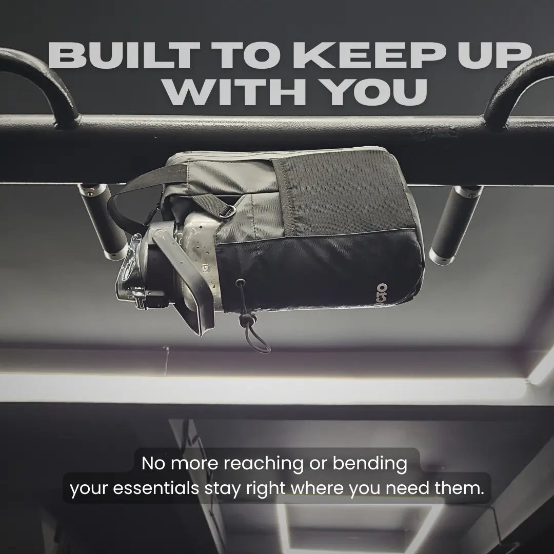 Magnetic gym bottle holder attached to rack keeping water bottle and essentials within easy reach during workout